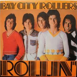 <div class='align-center'><strong>Bay City Rollers</strong><br><em>Rollin'</em><br><span class='note'>1974</span><br><span class="tag small"><strong>12"</strong></span><br><img src='images/formats/record_30.png' class='format_image'  style='background-color:#333333;' /><br>Added By <strong>cheaptrickster</strong></div>